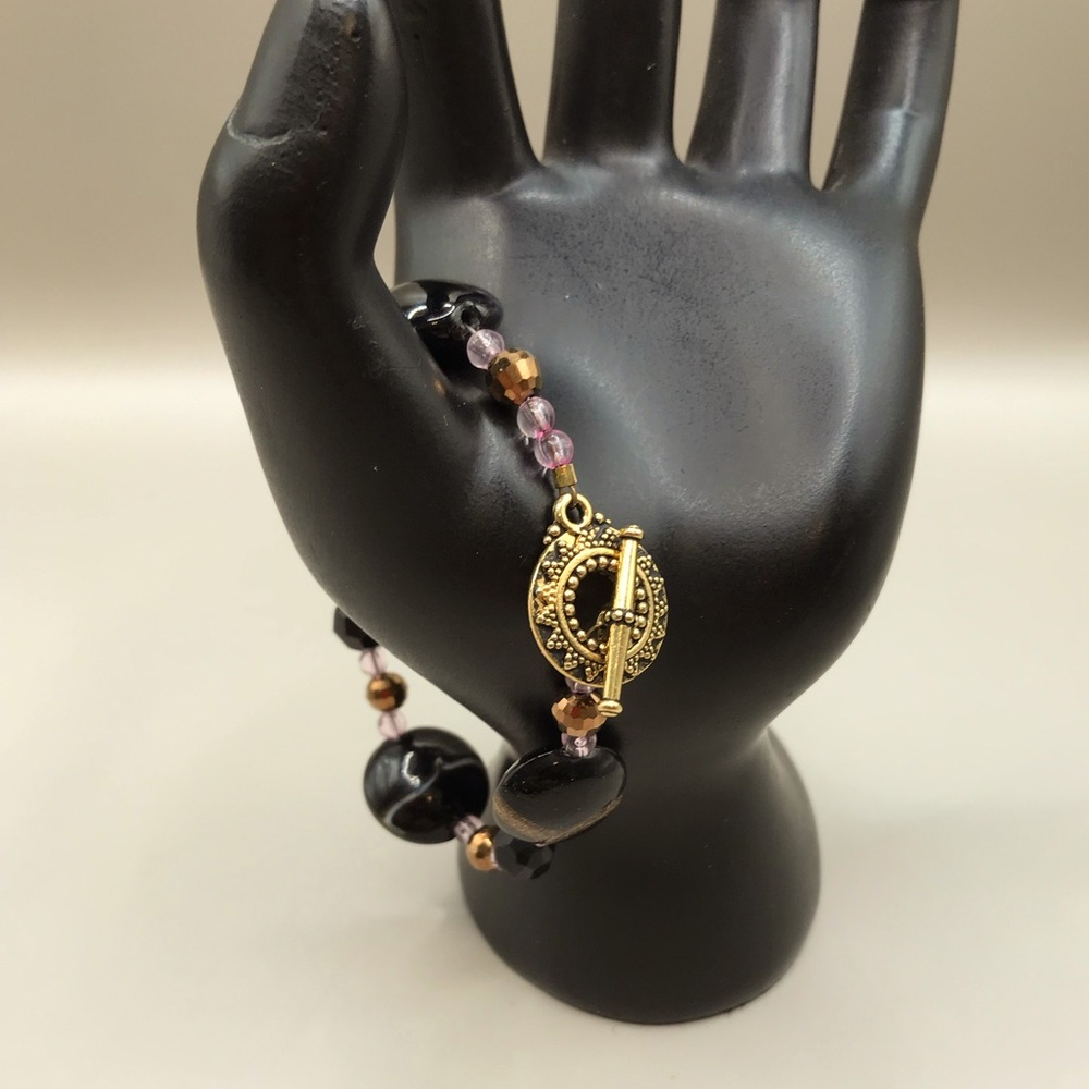 Elegant Black and Gold Bracelet